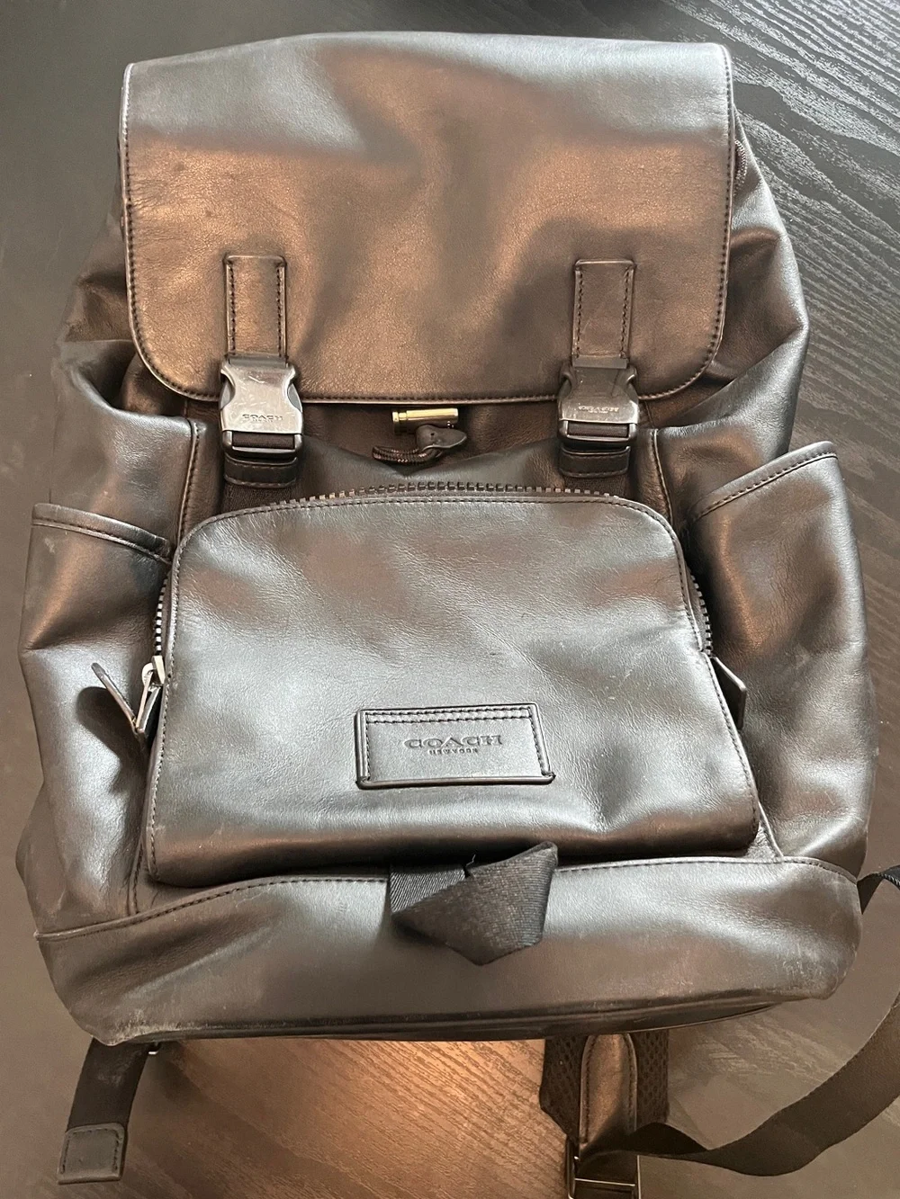 Coach Black Leather Men’s Backpack with Front Zip Pocket